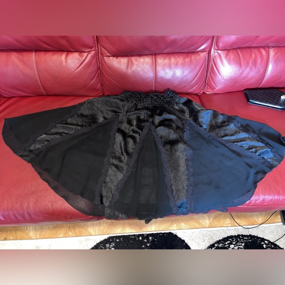 Black satin with lace trim, taffeta panels, flare knee length skirt. - Picture 8 of 8